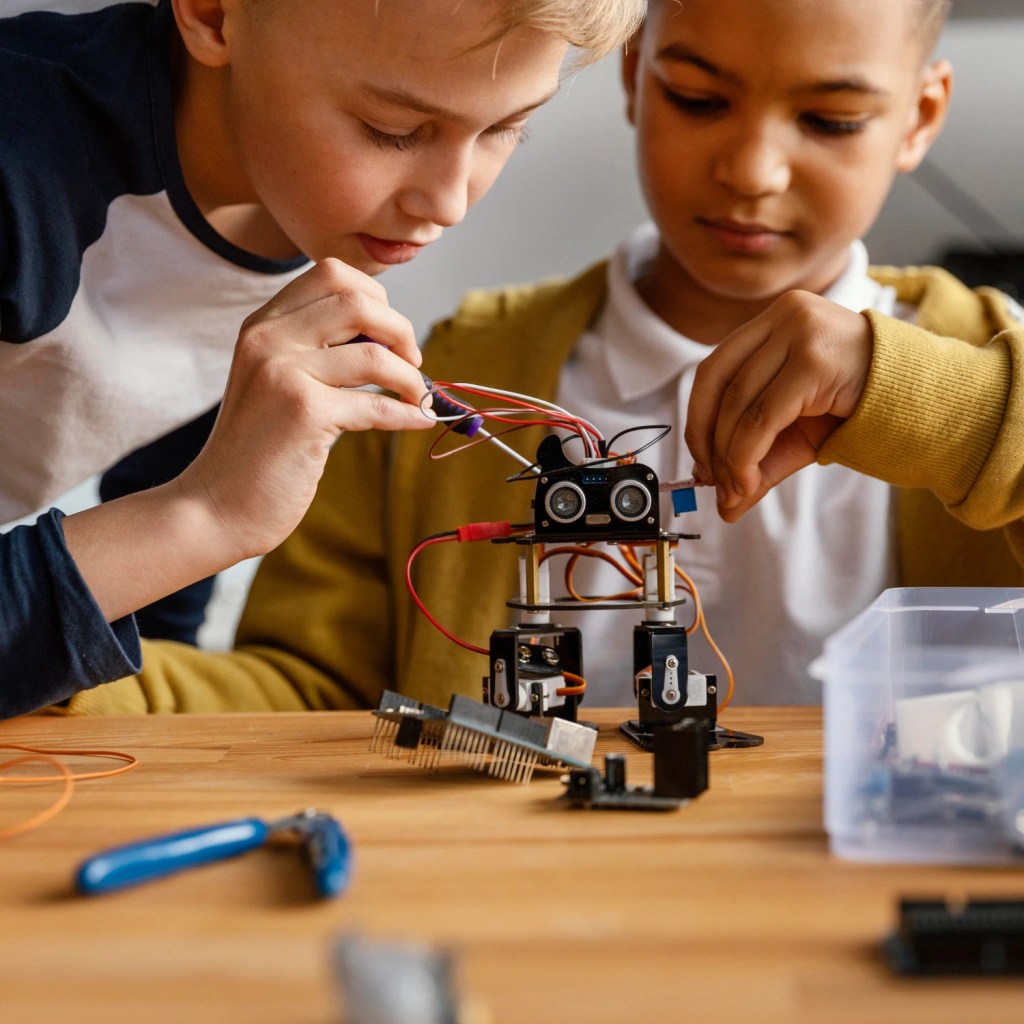 Students Experimenting with Technology in Robotics Lab for Schools