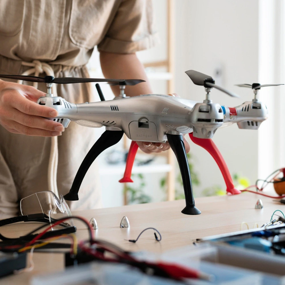 Teacher Experimenting with Drones