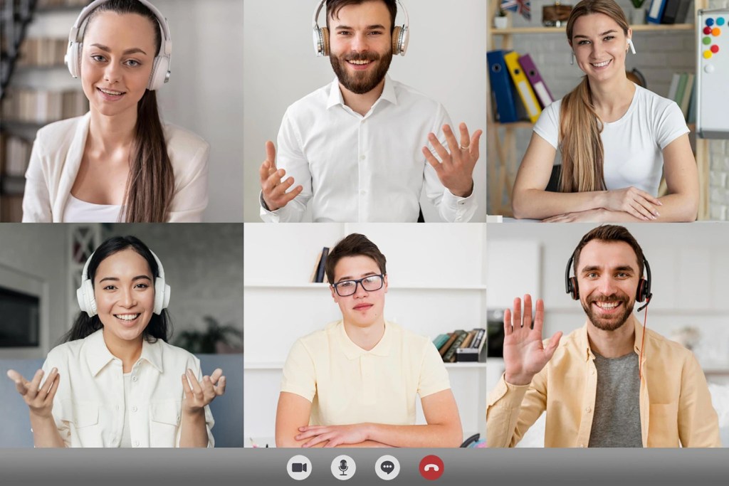 Employees raising their hands on an online conferencing software during a team meeting