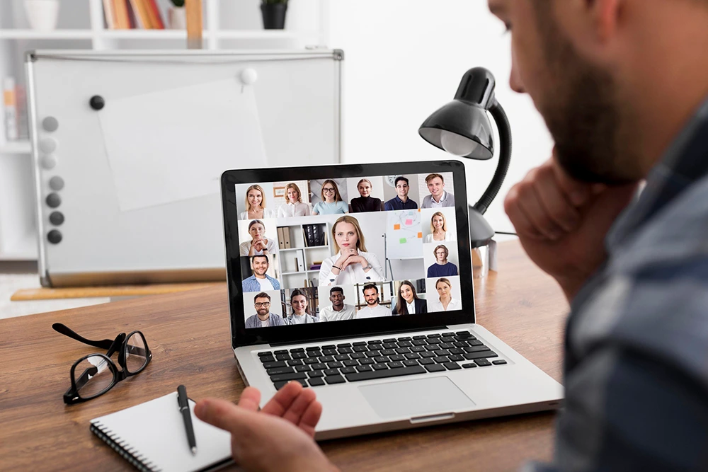 A person sharing files on a web conferencing platform during a virtual meeting